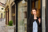 Attractive woman standing at hotel door in Upper Square with children in old town of Ljubljana capital city of Slovenia Europe