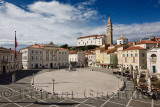 Tartini Square in Piran Slovenia with Courthouse, City Hall, Tartini statue, St. George's Parish Church with baptistry, and St P