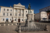 Statue and monument to Giuseppe Tartini in front of City Hall in Tartini Square Piran Slovenia with blue sky 