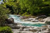 Turquoise water and smooth karst limestone of Soca river in Trenta Valley at Vrsnica Gorge Natural Monument Triglav National Par