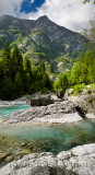 Turquoise water and karst limestone of Soca river in Trenta Valley at Vrsnica Gorge Natural Monument Triglav National Park Slove