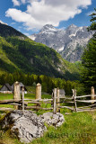 Snow capped Razor Peak in Triglav National Park Julian Alps from farmstead in Zadnja Trenta Valley Slovenia in Spring