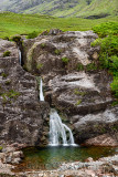 Falls of Glencoe waterfall at the Meeting of Three waters at the foot of Three Sisters mountains of Glen Coe Scottish Highlands