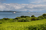Sound of Mull Ferries at Loch Linnhe with Lismore Lighthouse and Ben Cruachan mountains from Duart Castle bracken Scotland UK