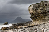 Elgol beach at Port na Cullaidh with Red Cuillin Mountains under clouds on Loch Scavaig Scottish Highlands Isle of Skye Scotland