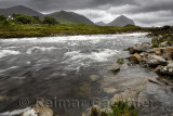 Beinn Dearg Mhor, Beinn Dearg Mheadhonach and Marsco peaks of Red Cuillin mountains at Sligachan river after a rain storm Isle o