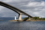 Skye Bridge over Kyle Akin Strait from Inner Sound to Loch Alsh and Eilean Ban Island with white Kyleakin lighthouse and cottage