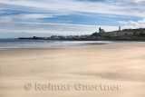 MacDuff village from Banff over River Deveran wide sand beach at Banff Bay Scotland UK with MacDuff Parish Church and War Memori