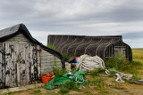 Thick heavy rope stored at overturned boat sheds on Holy Island of Lindisfarne Berwick-upon-Tweed England UK