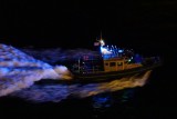 Sheriff boat escort at night - ISO 6400