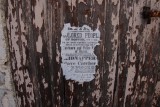 Barbados flyer on old door
