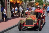 Firemen in their car on Main Street