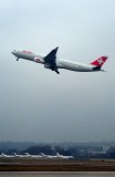 Swiss A330-300 HB-JHC, Climbing On A Very Cloudy Day