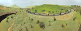 Large panorama showing 5 Genesis MRL SD70ACes pulling 50 loaded Walthers and ExactRail Trinity RD4 coal hoppers at Allard.