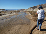 Taking pictures of pupfish at Salt Creek, Death Valley