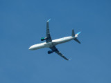 Frontier Airlines aircraft over Forest Park, St. Louis
