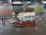 Piano player at Formosa Boulevard metro station.