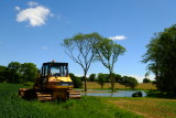 A  subtle  adaptation , using  a  Komatsu  bulldozer .