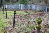 fenced grave