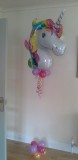 Beautiful foil unicorn head with lots of ribbon and baby balloon weights