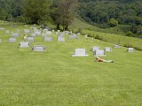 Mike, lying in Adams Cemetery