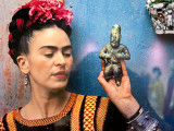 Frida with Olmec Figure by Nickolas Muray