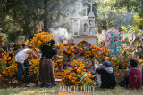 Decorating grave in Santa Fe de Laguna