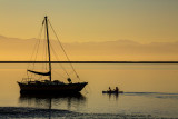 Couple approaching yacht Tasman Bay