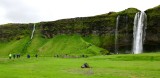 Visitors at Seljalandsfoss waterfalls, Iceland