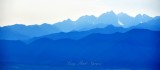 Mount Constance and Olympic Mountains in haze and smoke from forest fire, Over Port Ludlow, Washington 138