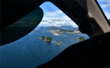 Base to final to runway 29 at Sitka Airport PASI, Alaska 049  