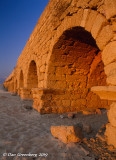 Roman Aqueduct on the Beach at Sunset