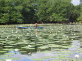 Back on the water - lady selling handicrafts