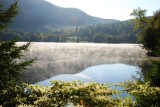 Misty morning on a mountain lake
