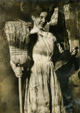 Girl with a Broom and Dustpan  