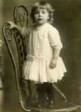 Child Standing on a Chair 