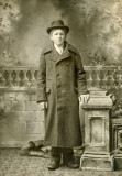 Young Man with a Long Coat  