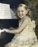 Mom Playing the Piano - Age 9 - 1937.jpg