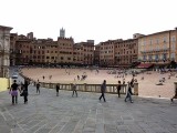 Piazza del Campo- Medieval bricked square surrounded by elegant palaces, famous for hosting the Palio horse race
