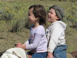 kids enjoying riding double