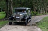 1931 Model A Ford driving a man to his party on his 100th birthday