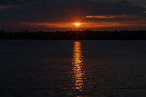 Sun comes out from behind the clouds before sunset 2019 July 22