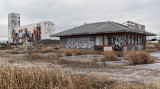 Grain Elevator and Abandoned Used Car Lot