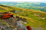 Rusted remains with Carmarthenshire in the background.
