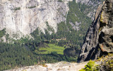 A flooded meadow along the Merced River in Yosemite Valley as seen from the Pohono Trail in Yosemite National Park