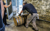Rolling a barrel out of the Bottling House at the Woodford Reserve Distillery