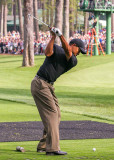 Tiger Woods tees off on the par three 16th