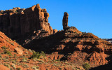 A balanced rock formation in the shadows of the early morning sun in Valley of the Gods