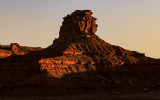 Jagged rock formation at sunset in Valley of the Gods