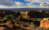 Sunset darkens Monument Canyon as seen from Grand View in Colorado National Monument